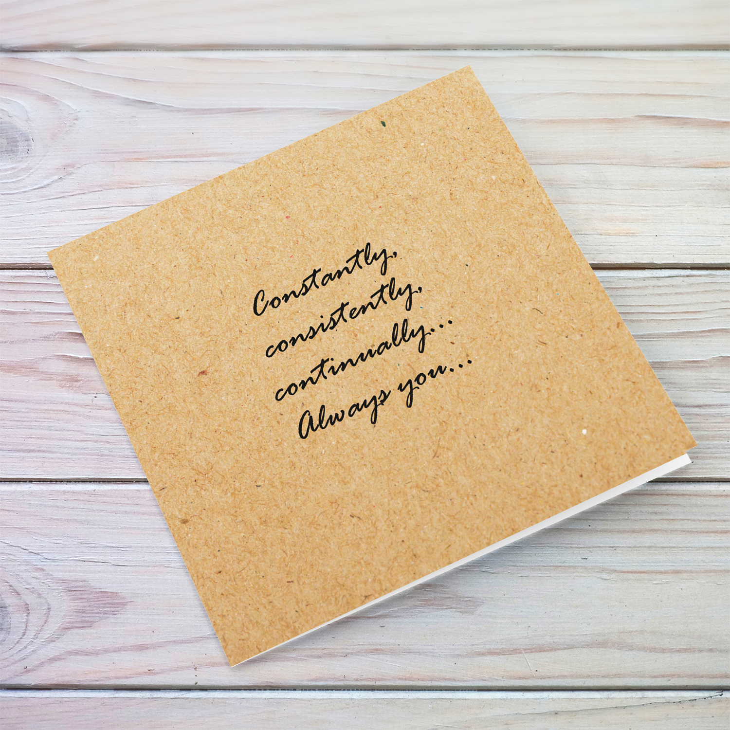 Romantic card with a special message for someone you love in a brown paper background in English (Blank message inside)