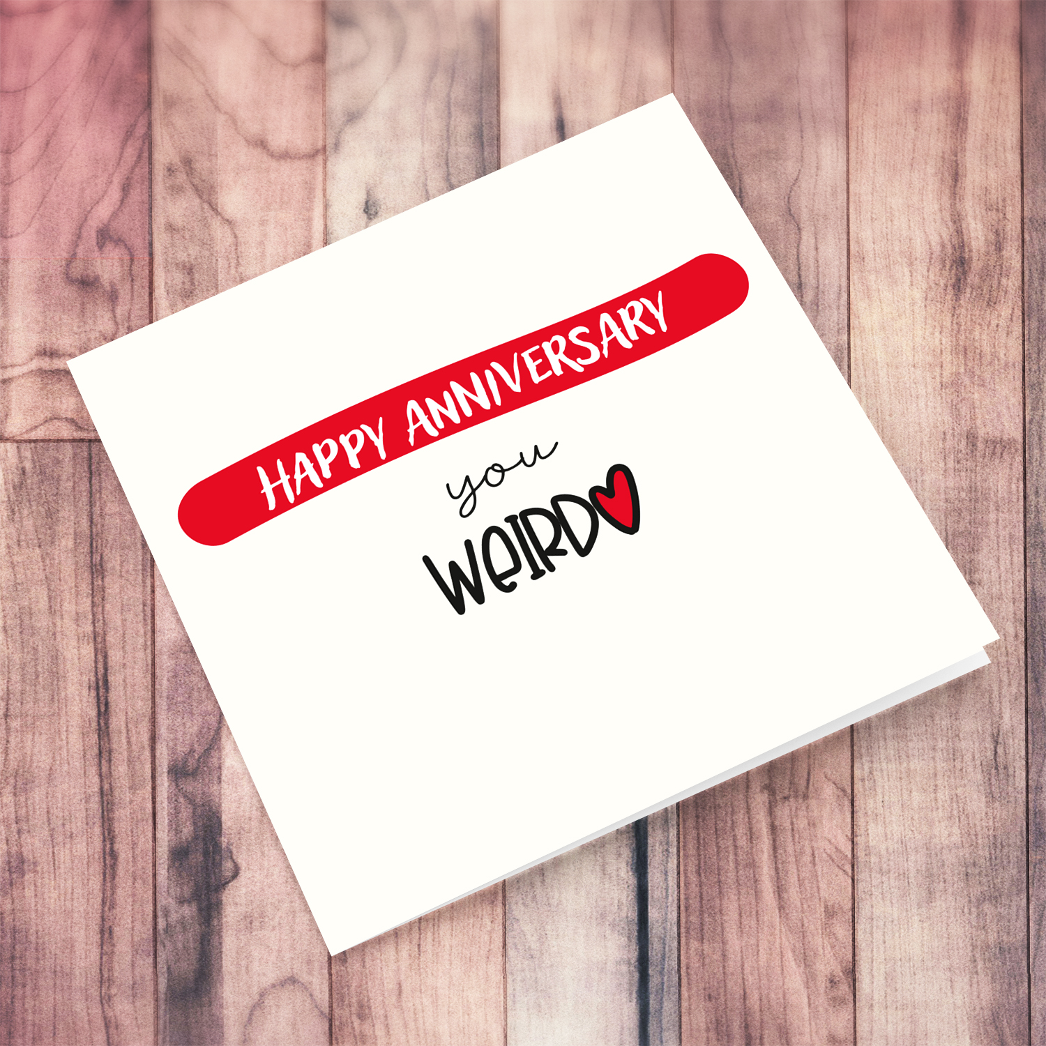 Funny Anniversary Card - Happy Anniversary you weirdo in a cream background and red touches in English 