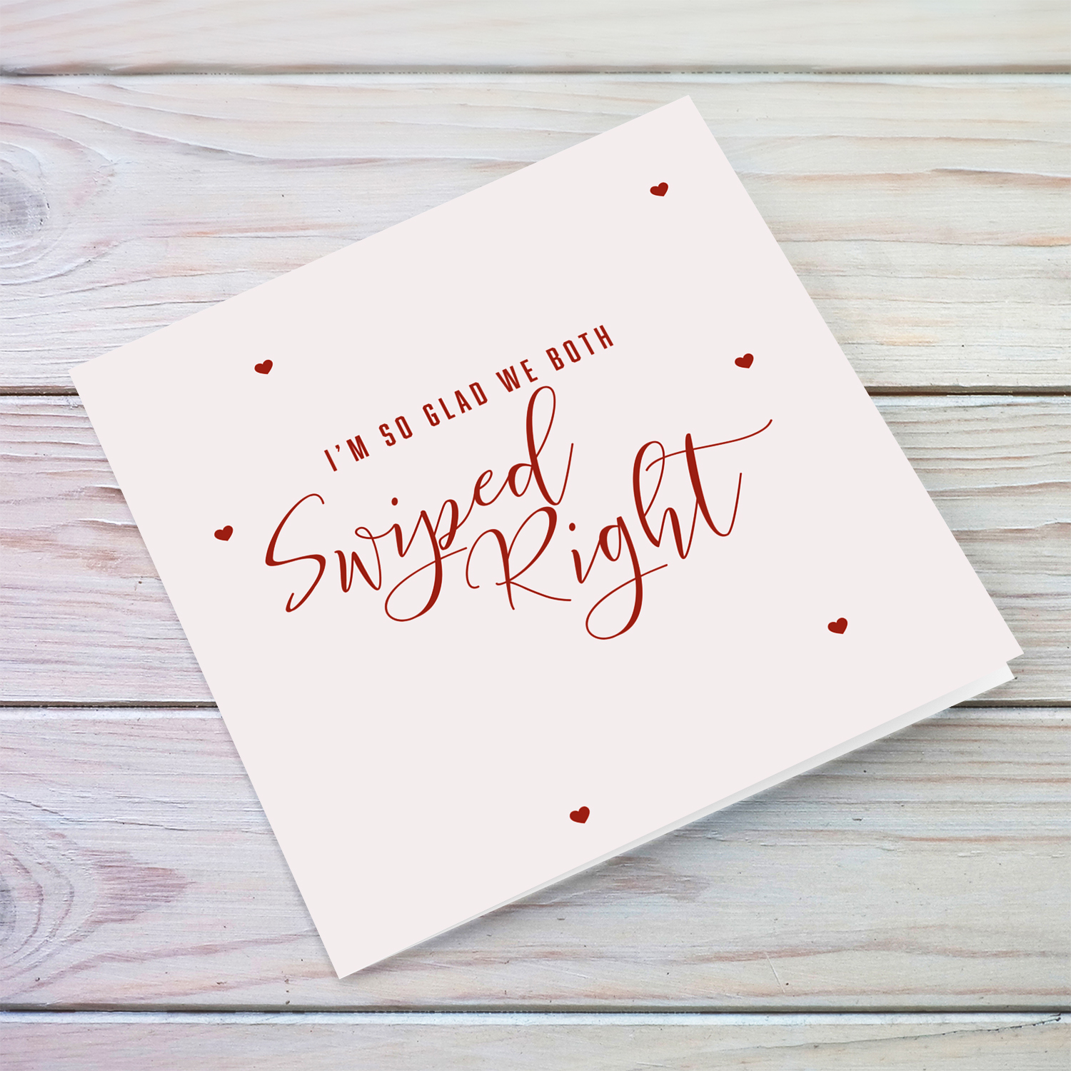 A funnty card - I'm so glad we both swiped right in a monochrome colour and scattered hearts in English