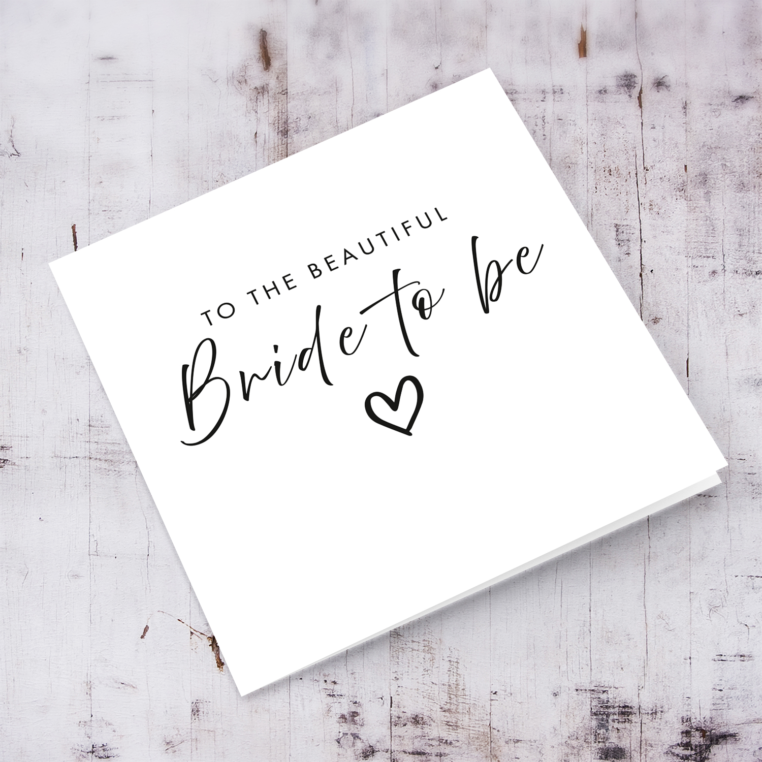 A minimalist monochrome hen party card - to the beautiful bride to be in Black text and heart - English