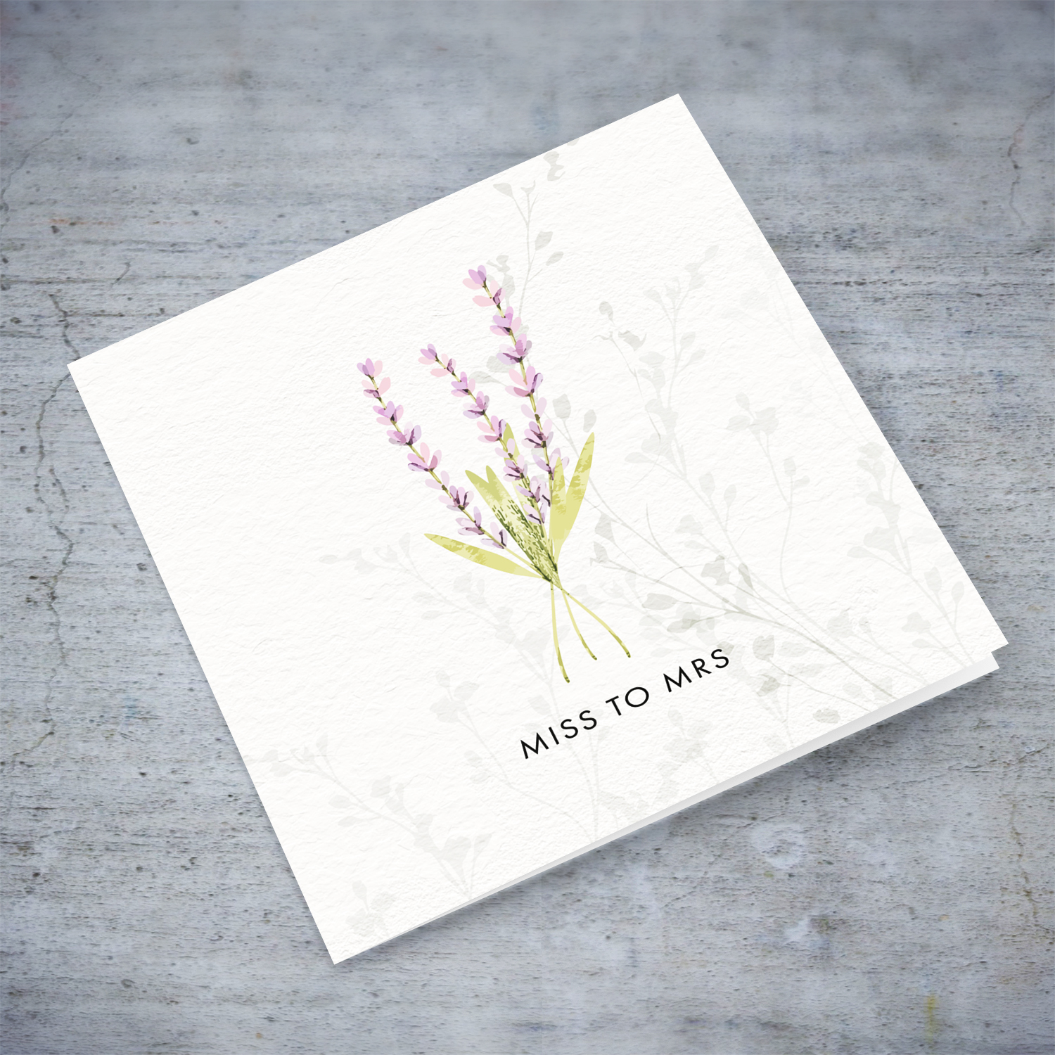 A dainty minimalist hen party card, from Miss to Mrs, featuring a light purple floral detail in English
