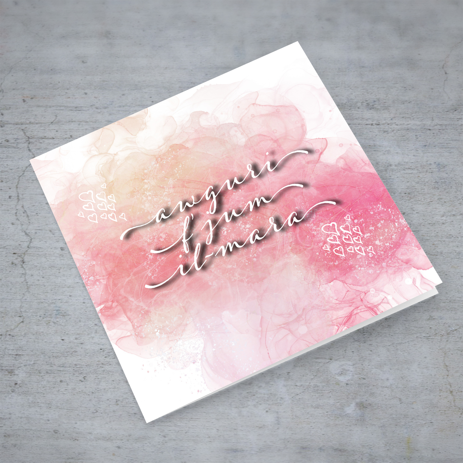 Happy women's day in pink background and hearts in Maltese