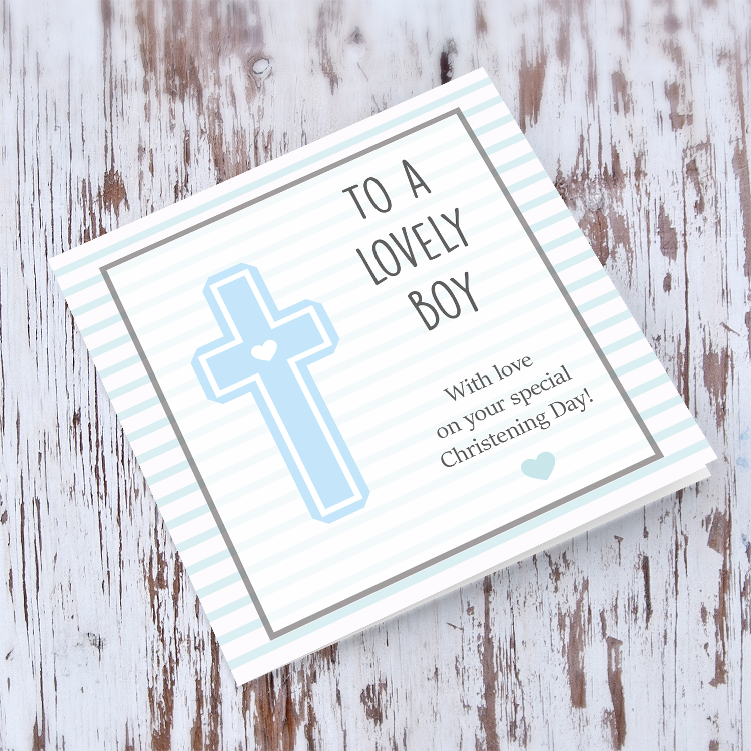 Baptism card with light blue cross with striped background for a lovely boy in English