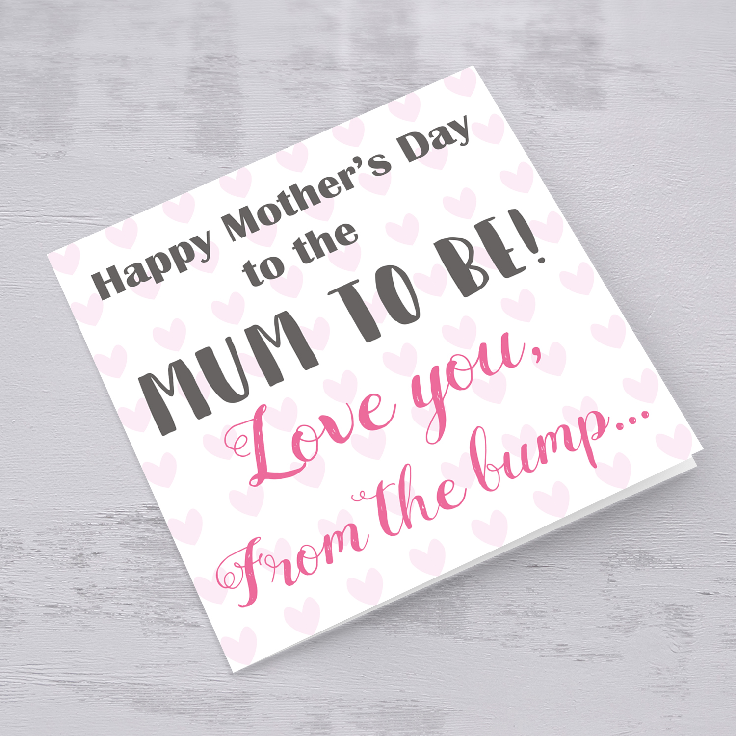 Mummy to be Mother's Day Card in English from the bump with pink pastel hearts in the background