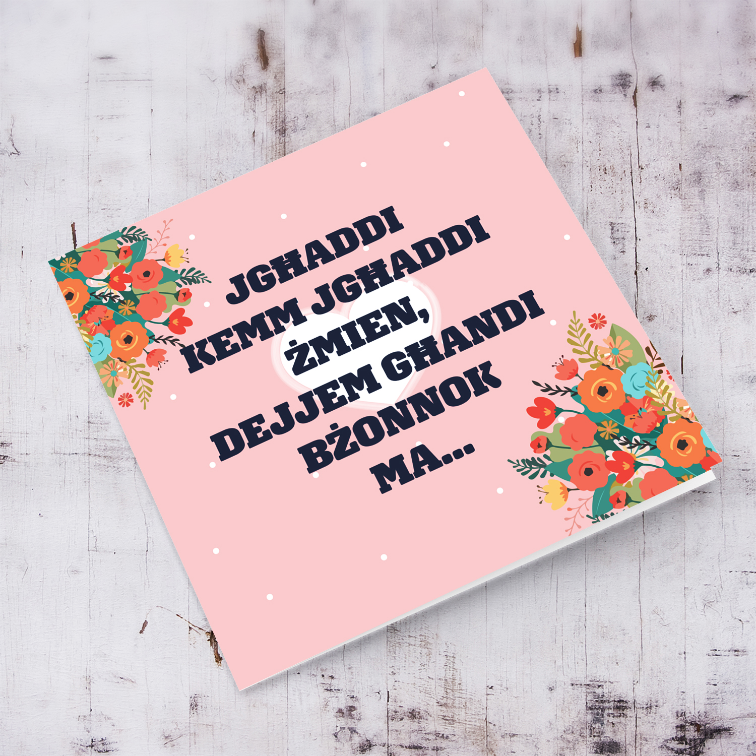 Beautiful Mother's Day card with a special message for your Mum in Maltese (with pink background, white heart and florals)