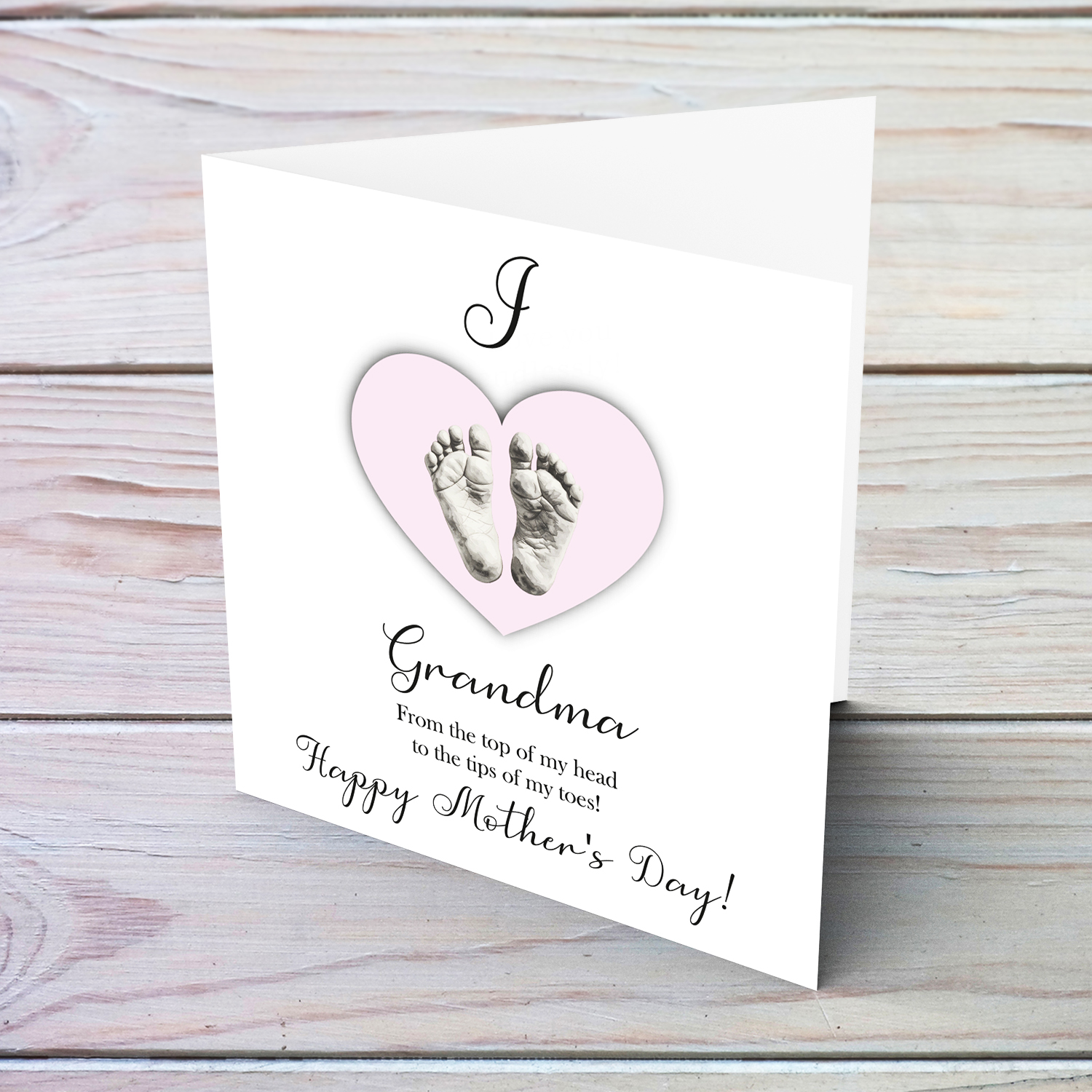 A cute baby footprint mother's day card for grandma, I love grandma, in a light pink heart in English