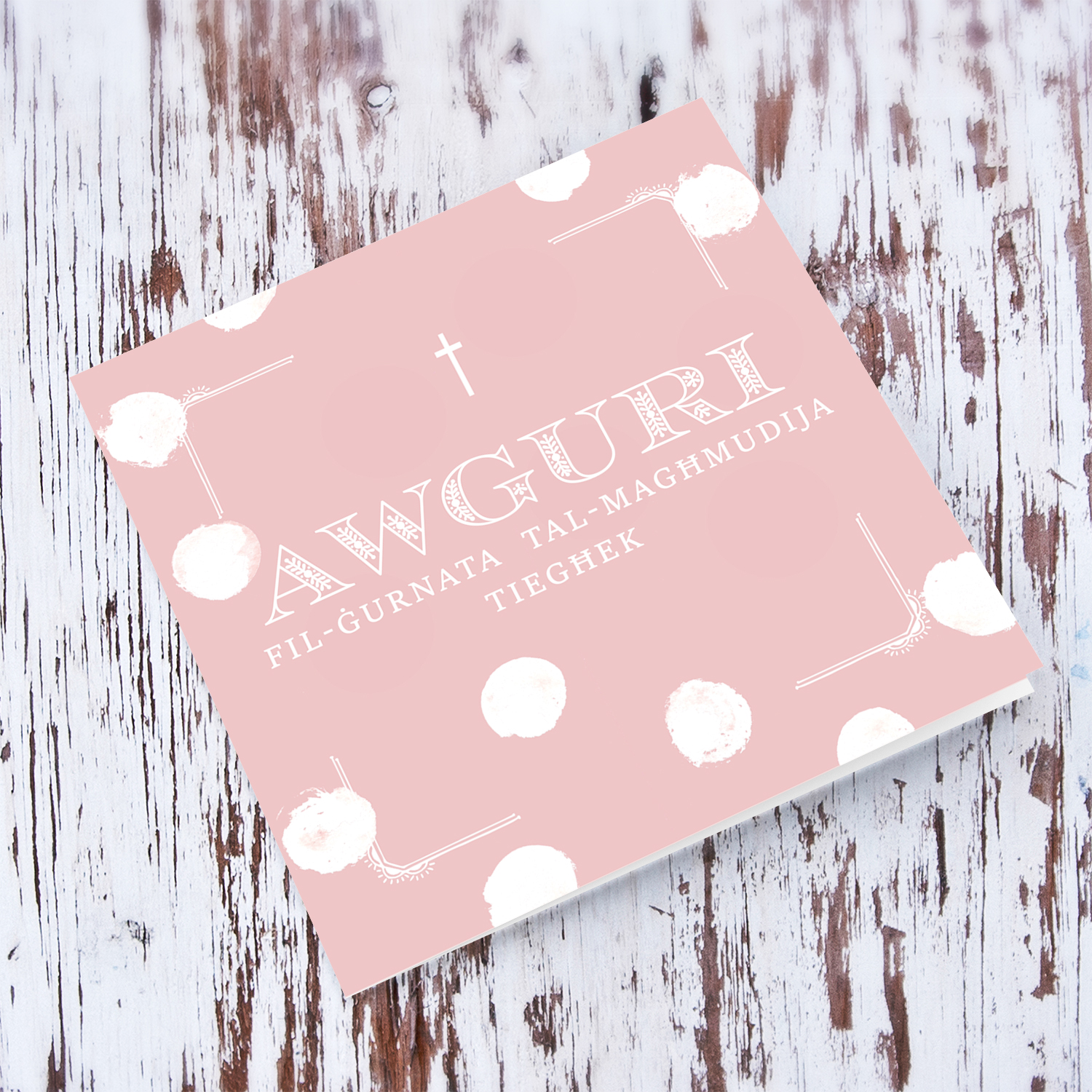 Pink monochrome Baptism card for girl in scattered white dots with a dainty cross in Maltese