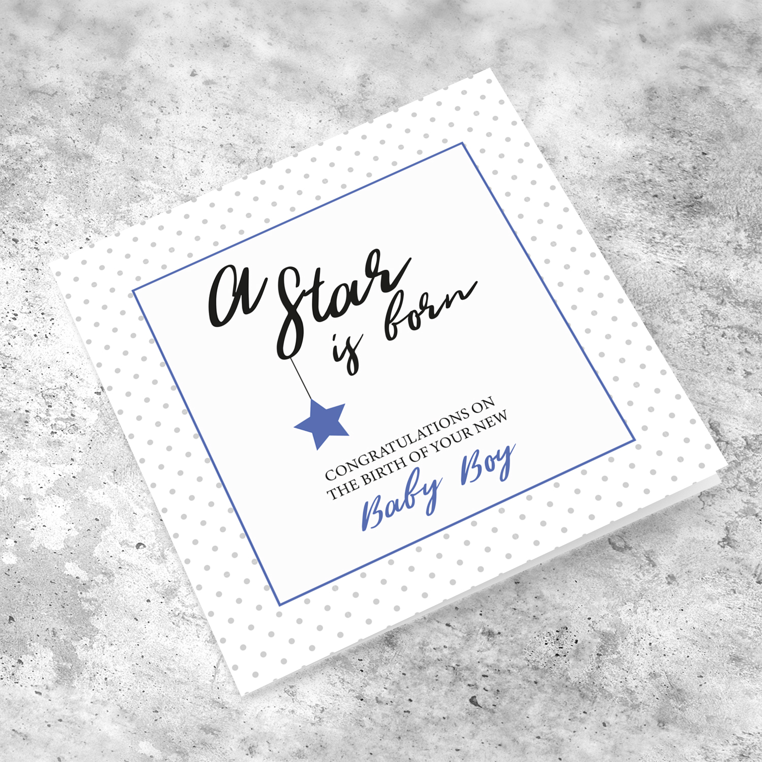 New born card for boys with polka dotted background and blue square with star in English