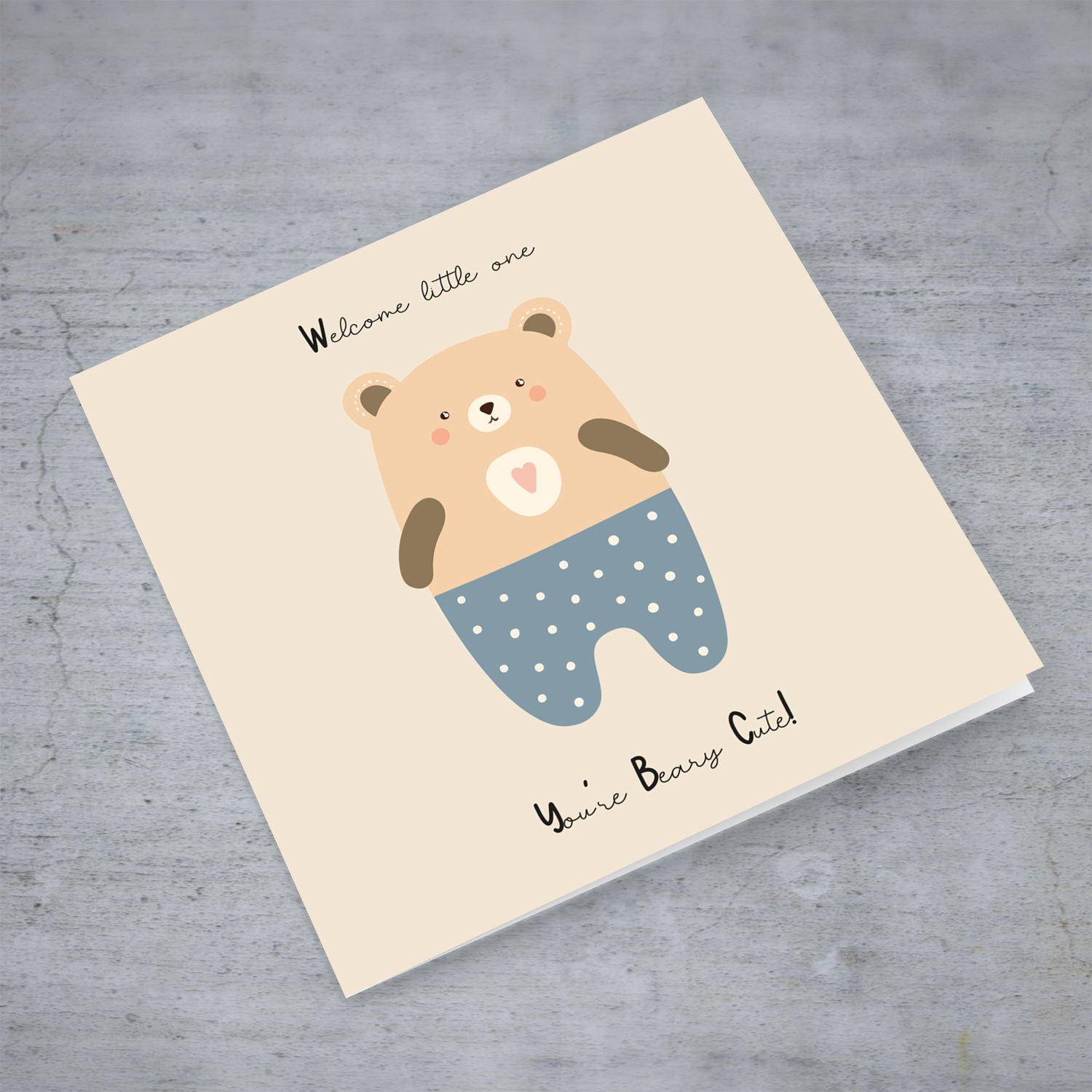 Beary Cute teddy bear, wearing blue pants with white dots New Born card for Boys in English