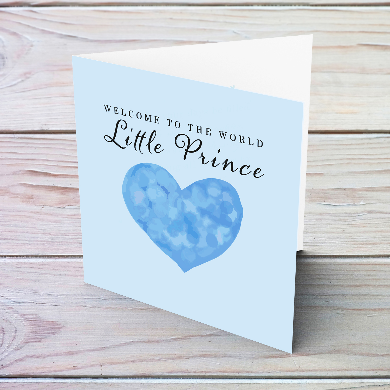 A new born card in blue background with a cute blue watercolour heart - to a little prince in English