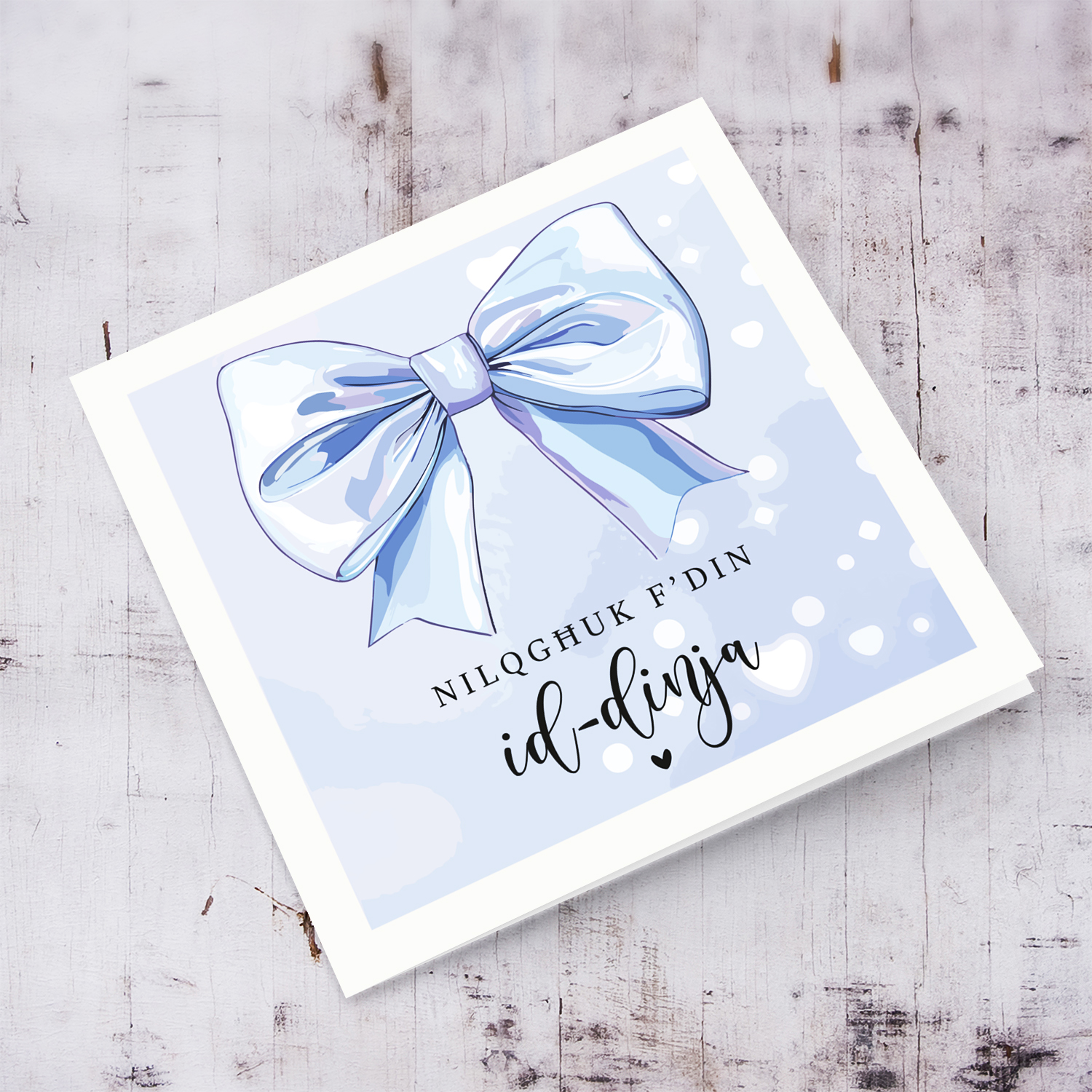 A cute newborn card for baby boy with a big light blue bow in Maltese