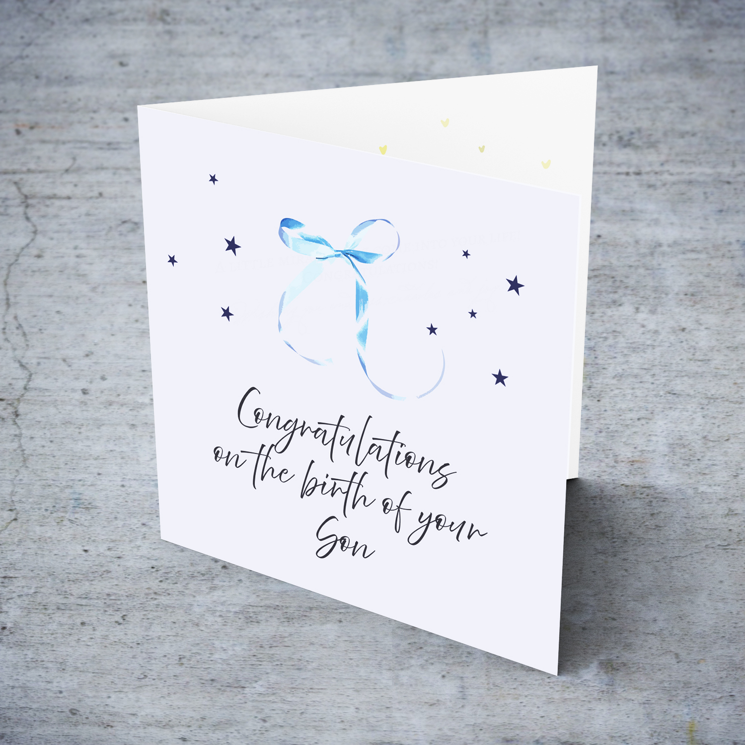 Minimalist and dainty new born card with cute blue bow and light blue background in English