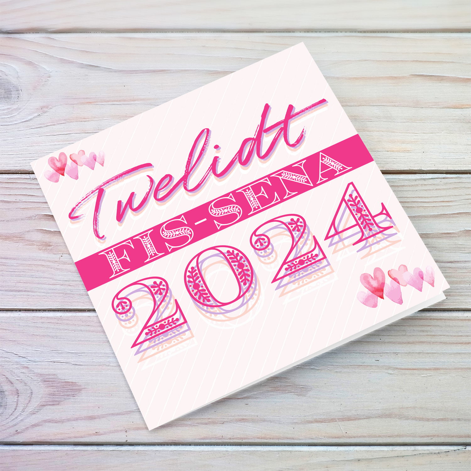 Born in 2024 card for new born girl with scattered pink hearts in Maltese