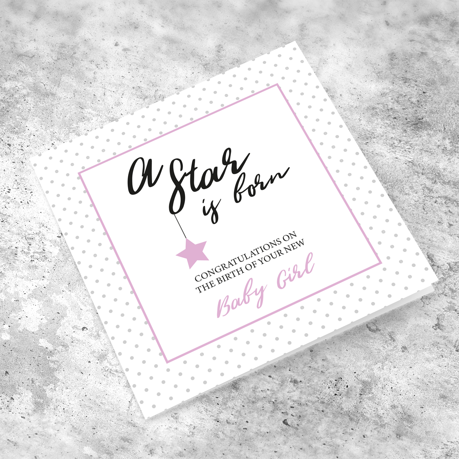 New born card for girls with polka dotted background and pink square with star in English