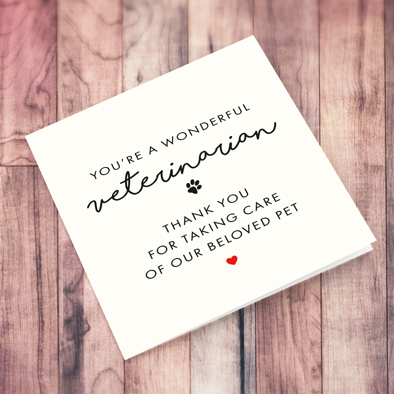 Minimalist thank you card for Veterinarian with red heart and black paw print in English