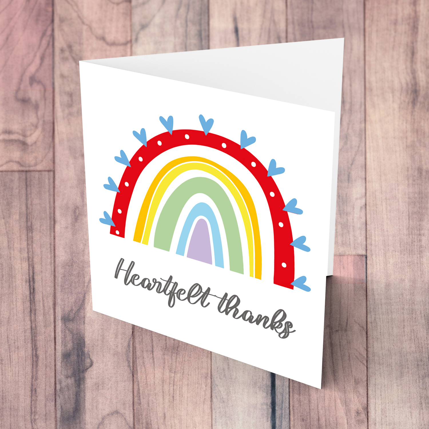 Colourful rainbow with blue hearts thank you card in English