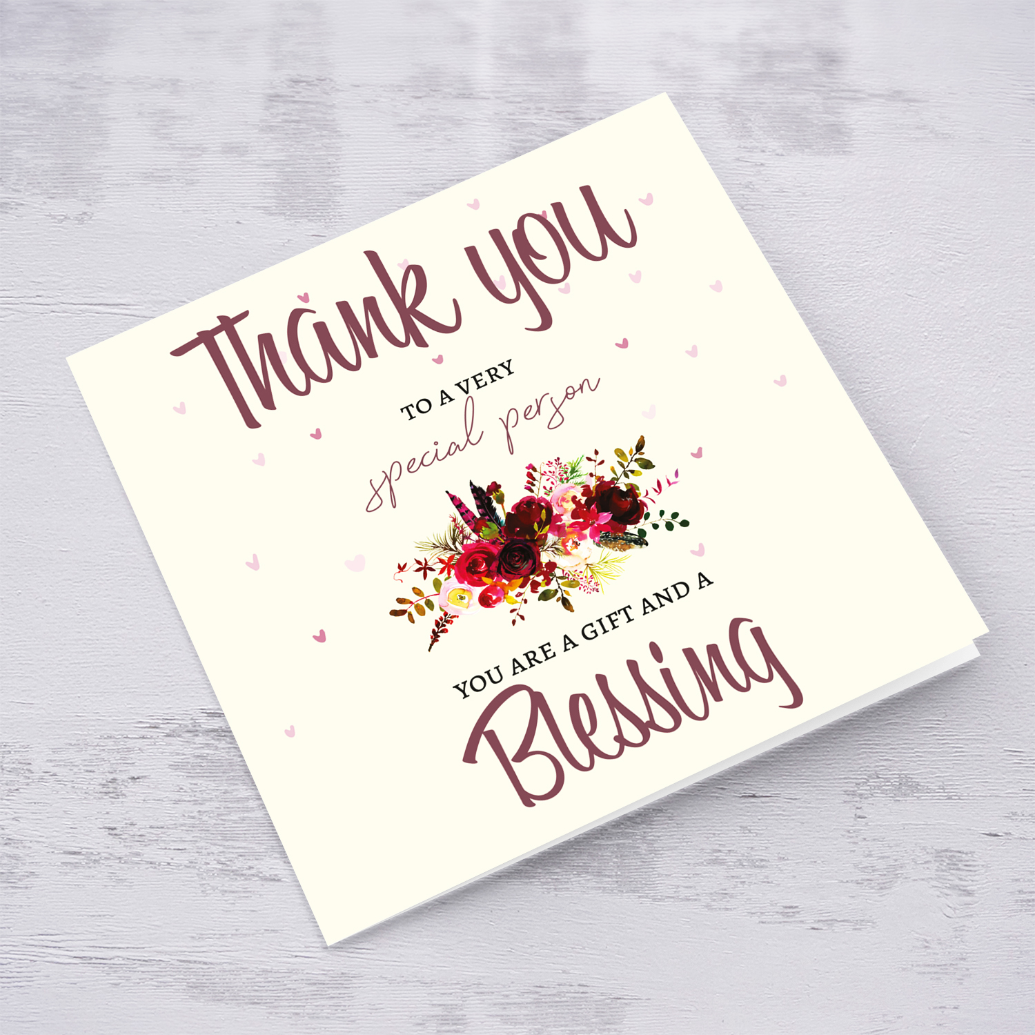 A thank you card for a special person with red florals in English