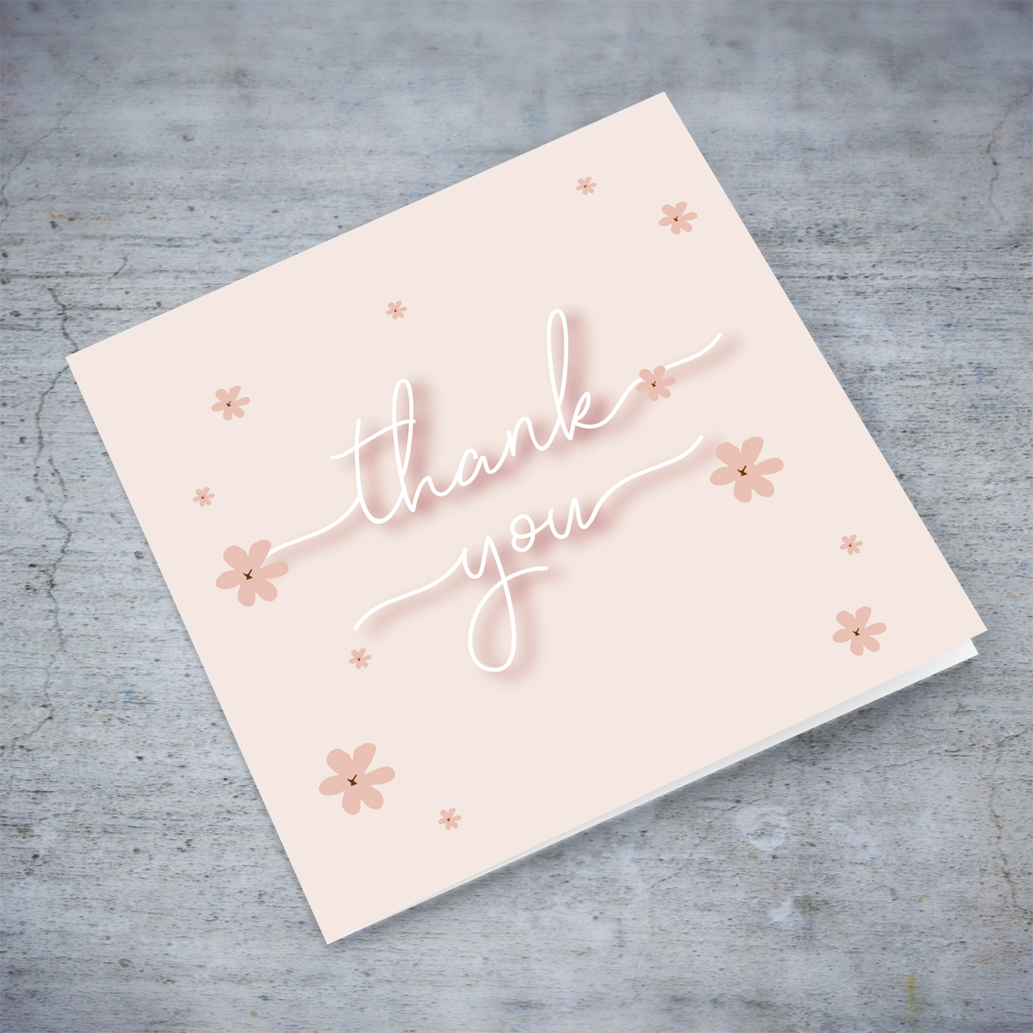 Light pink background thank you card with scattered pink flowers and white text in English