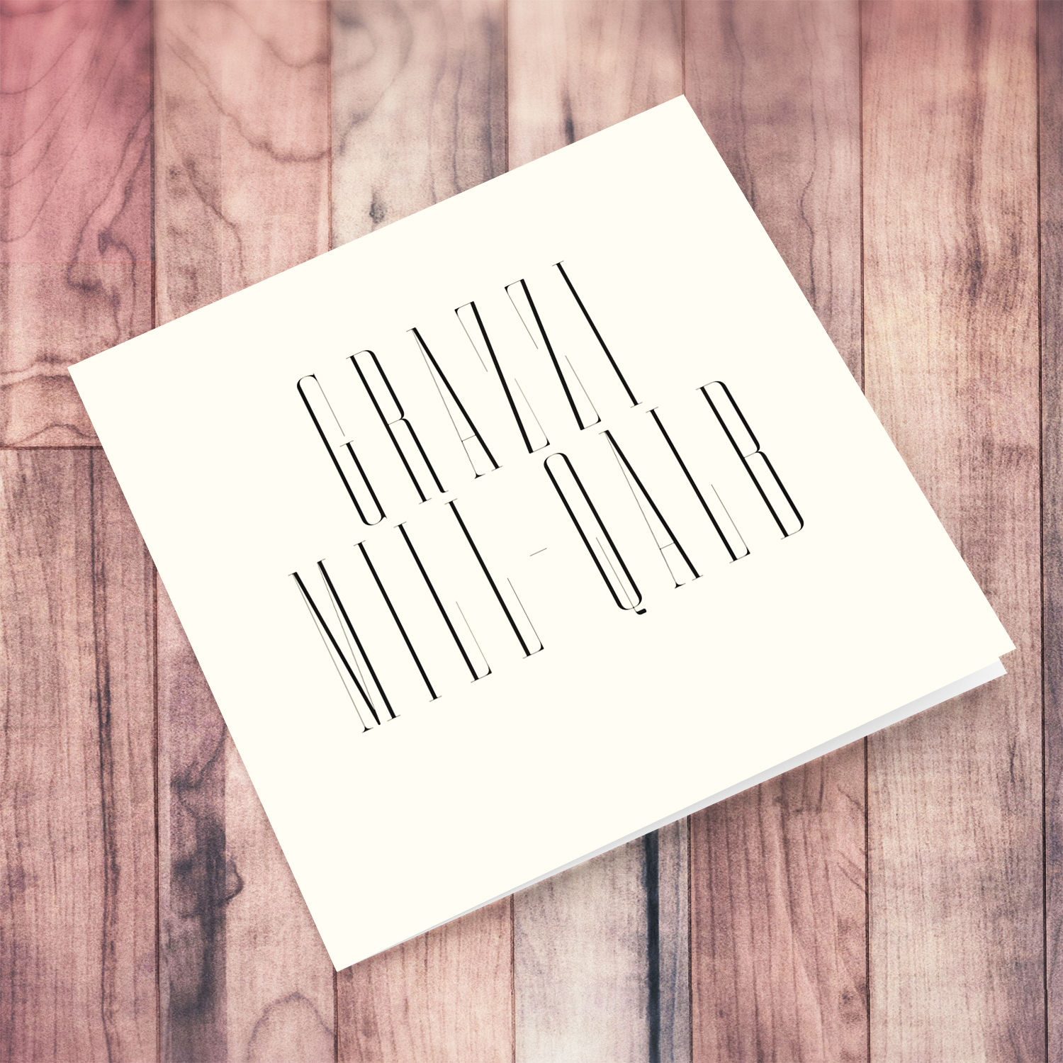 Minimalist text "thank you" card in black text and cream background in Maltese (Blank message)