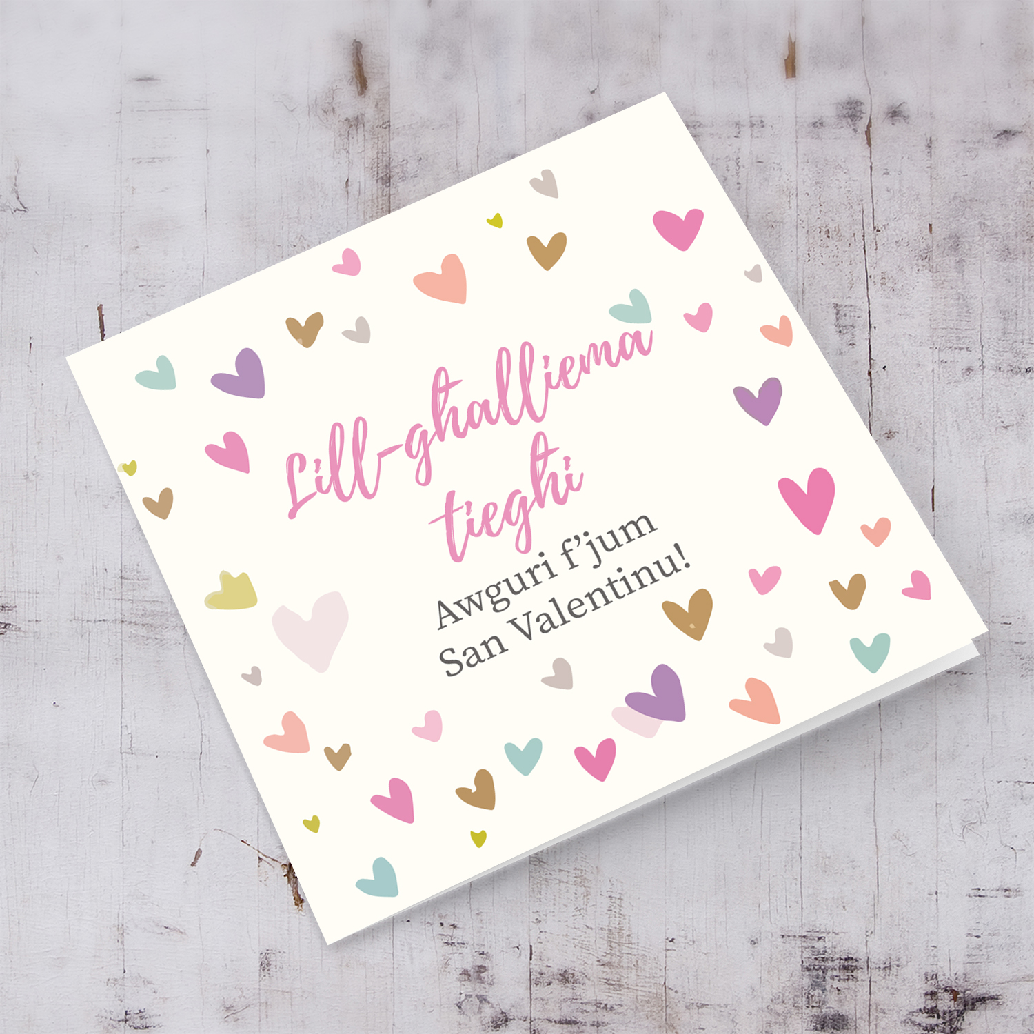 Colourful heart background Valentines card for teacher in Maltese