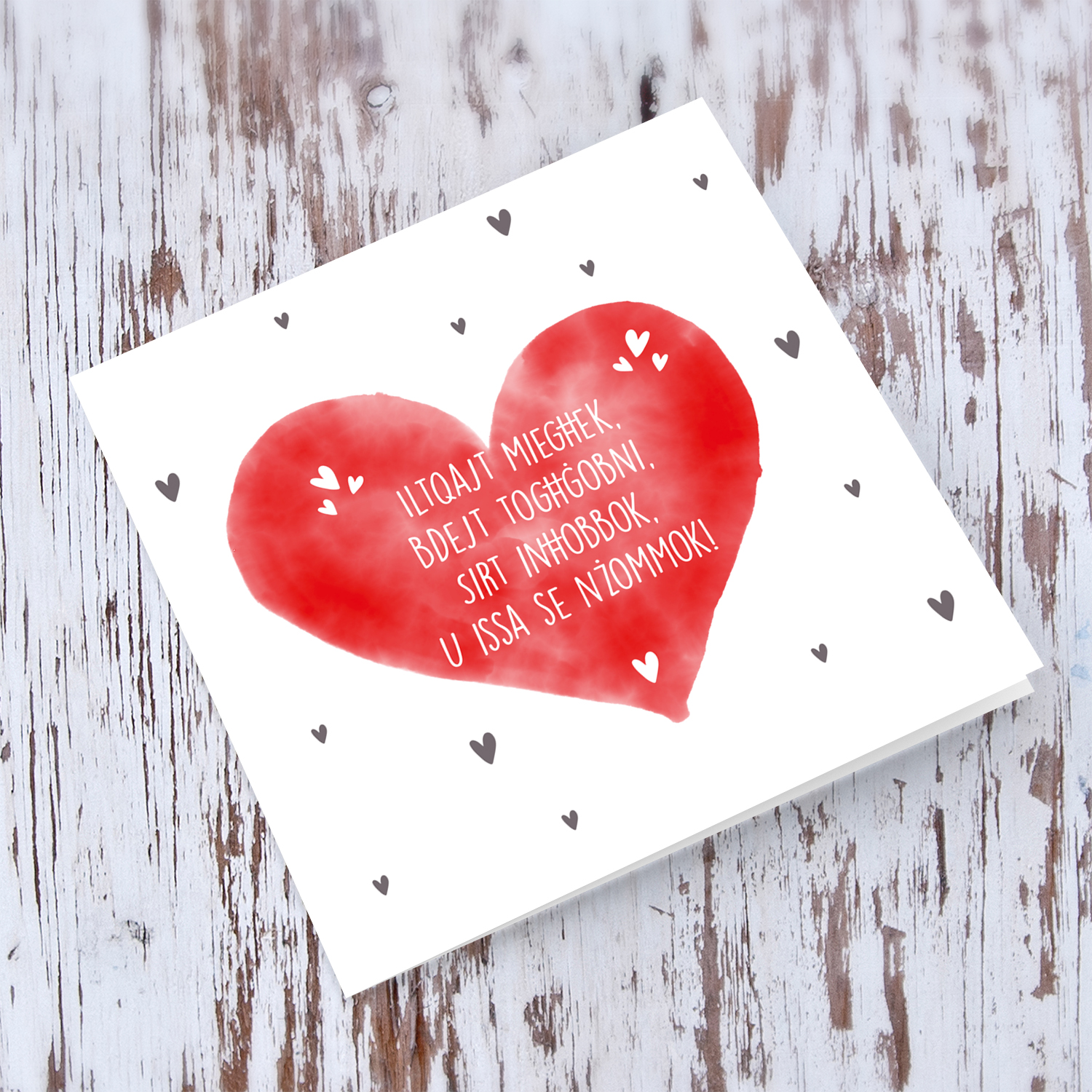 Red heart valentines card in Maltese
