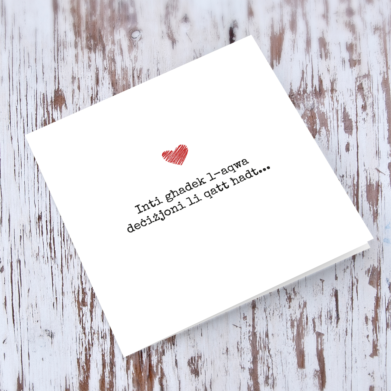 Minimalist Valentine's Day card with red heart in Maltese