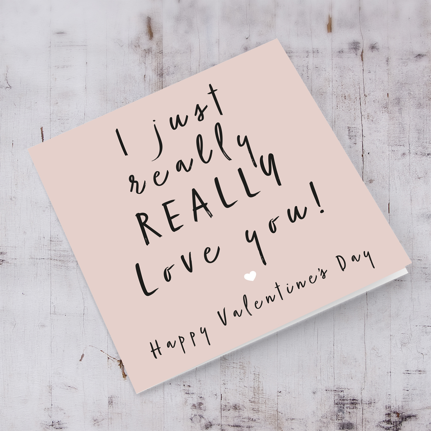 Pink background with black text Valentine's Card in English