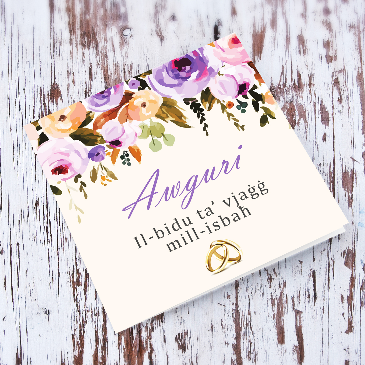 A floral themed Wedding Card in purple and pink colours in Maltese 