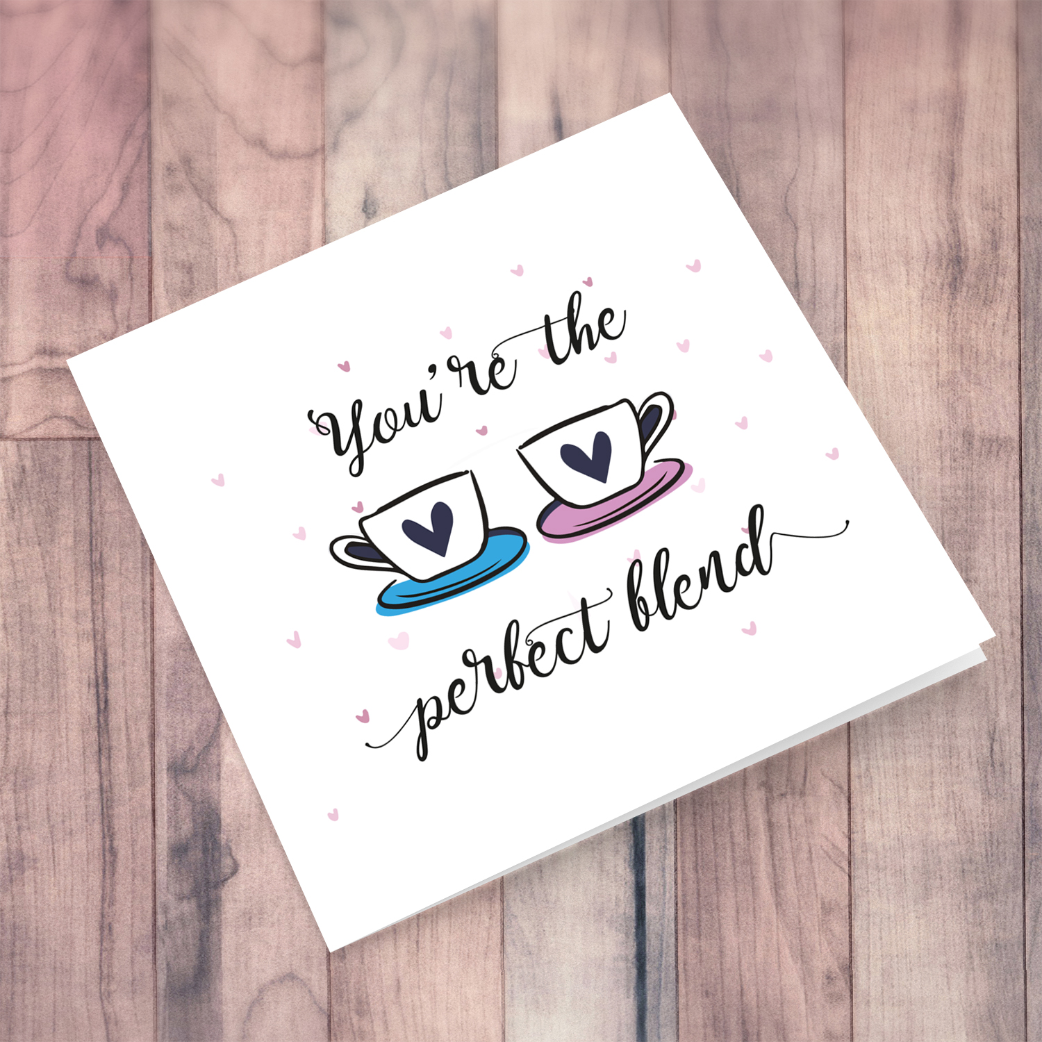 Cup themed wedding / engagement card with scattered hearts in English