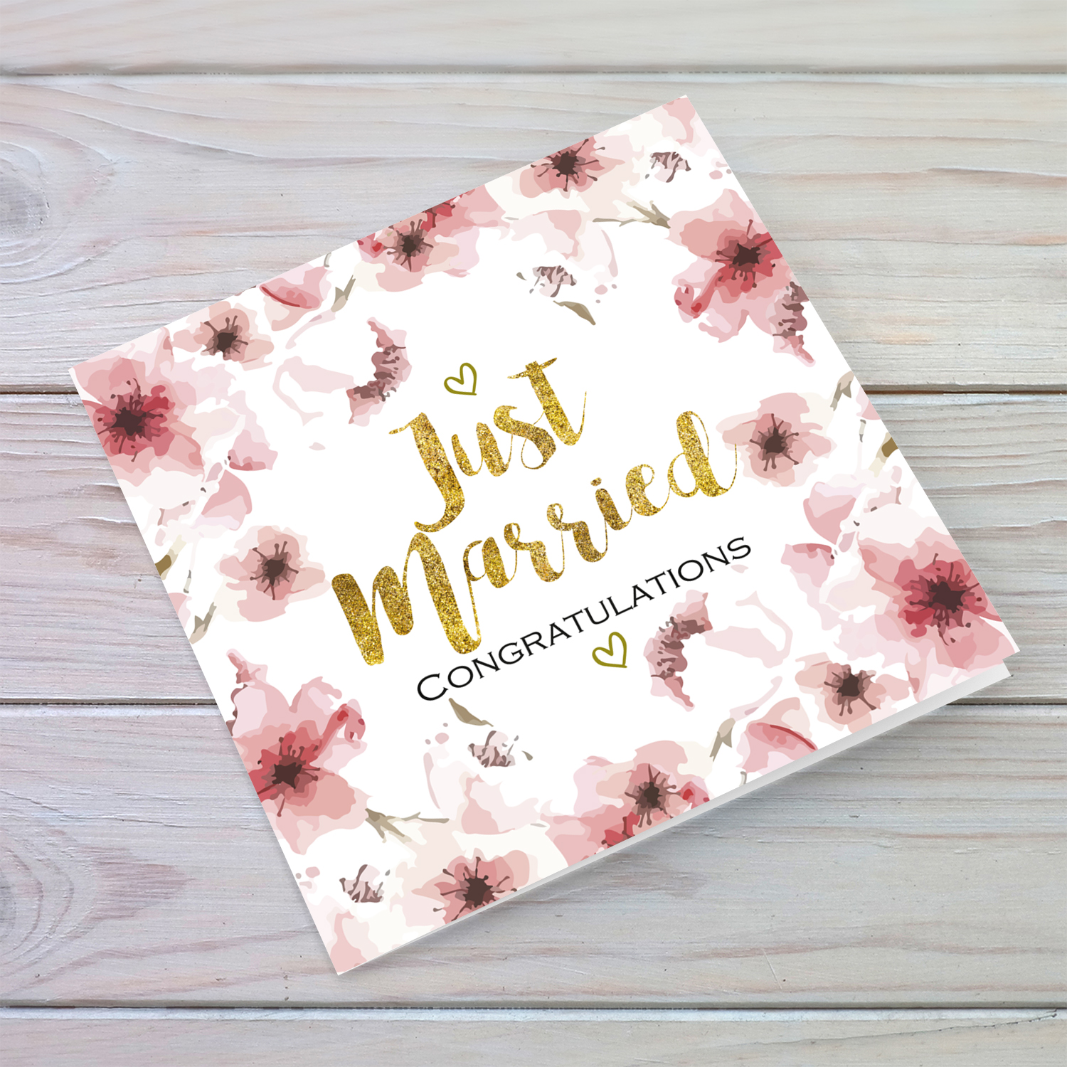 Pink flowers themed wedding card with golden text wedding card in English