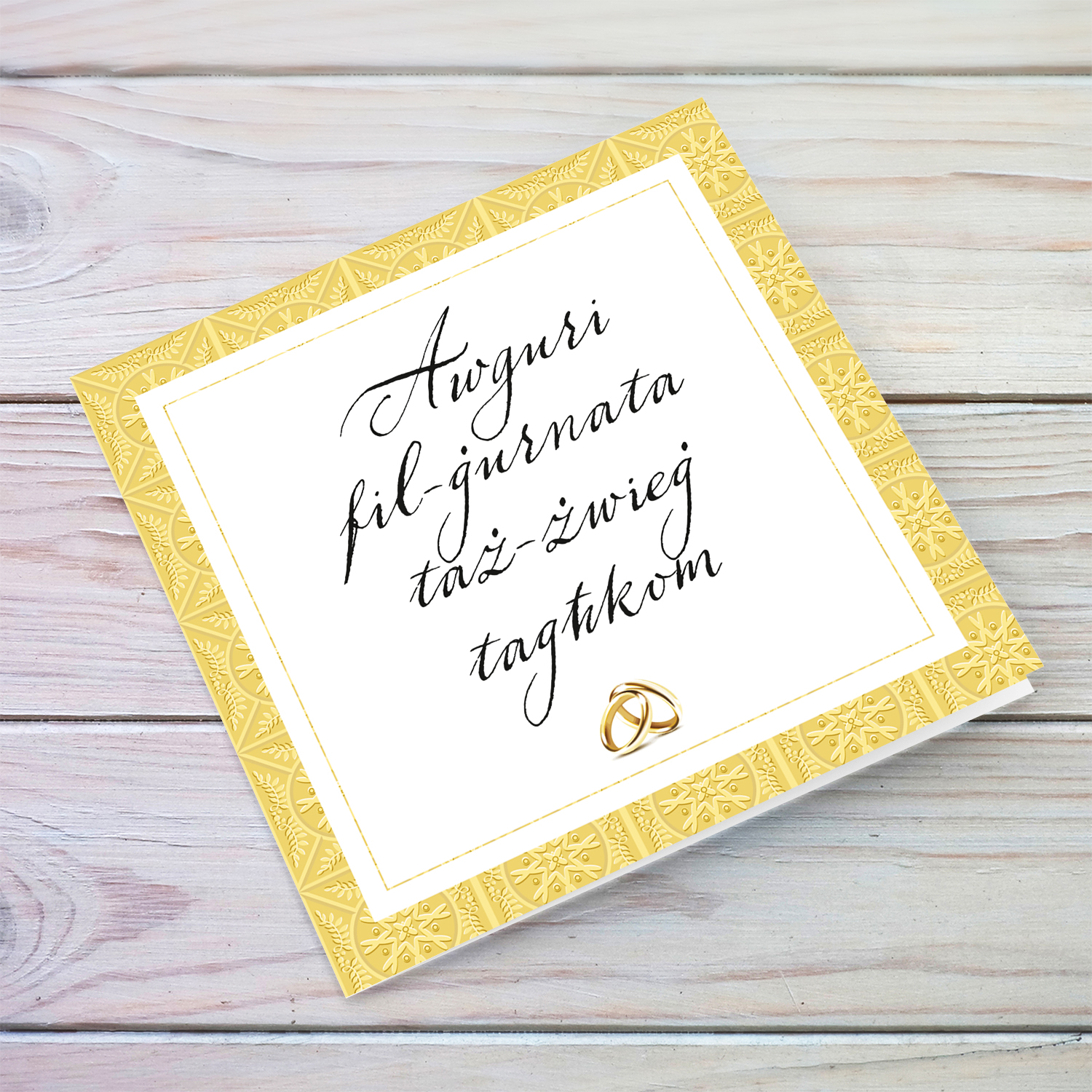 Golden border wedding card with wedding bands in Maltese