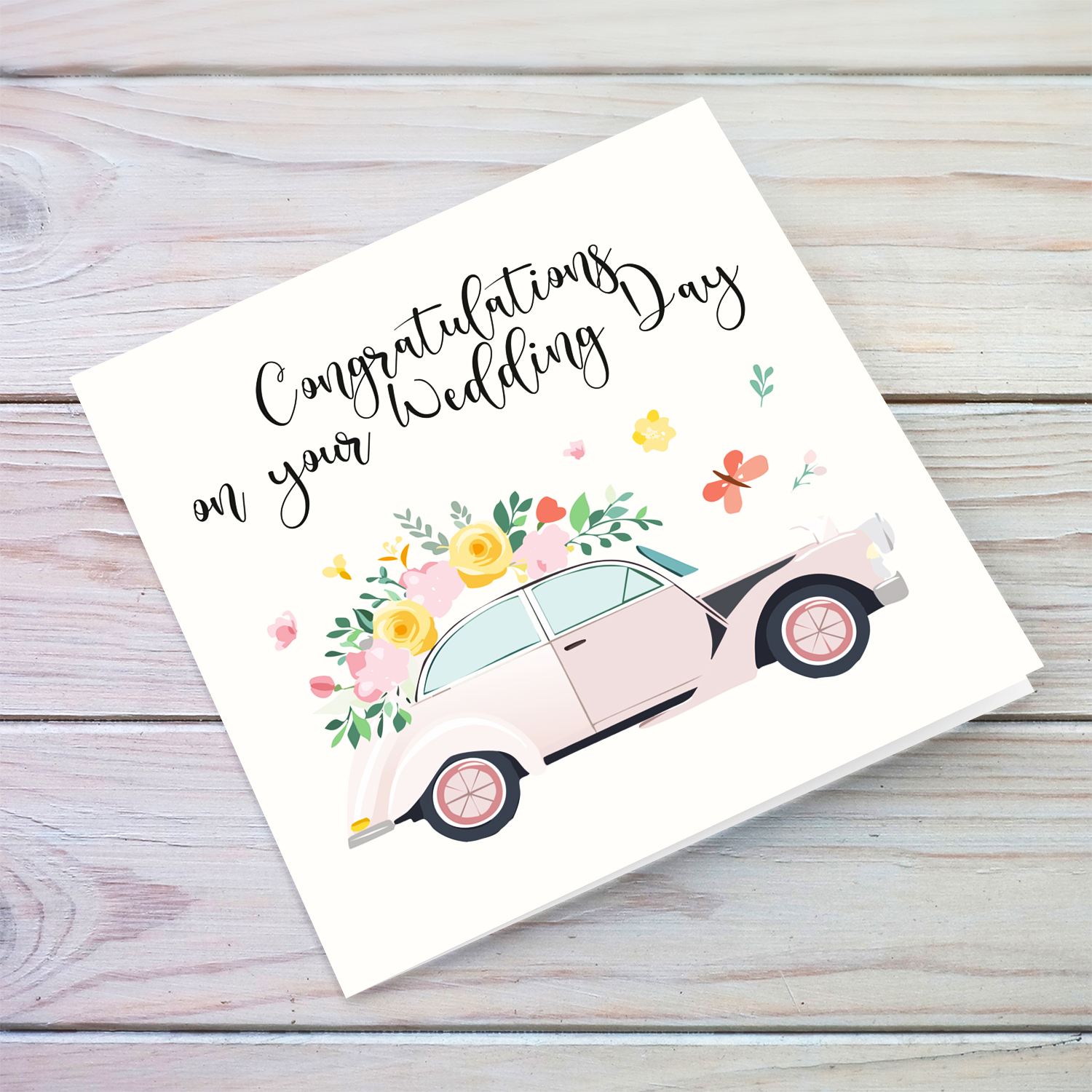 Wedding car themed wedding card with florals and neutral background in English