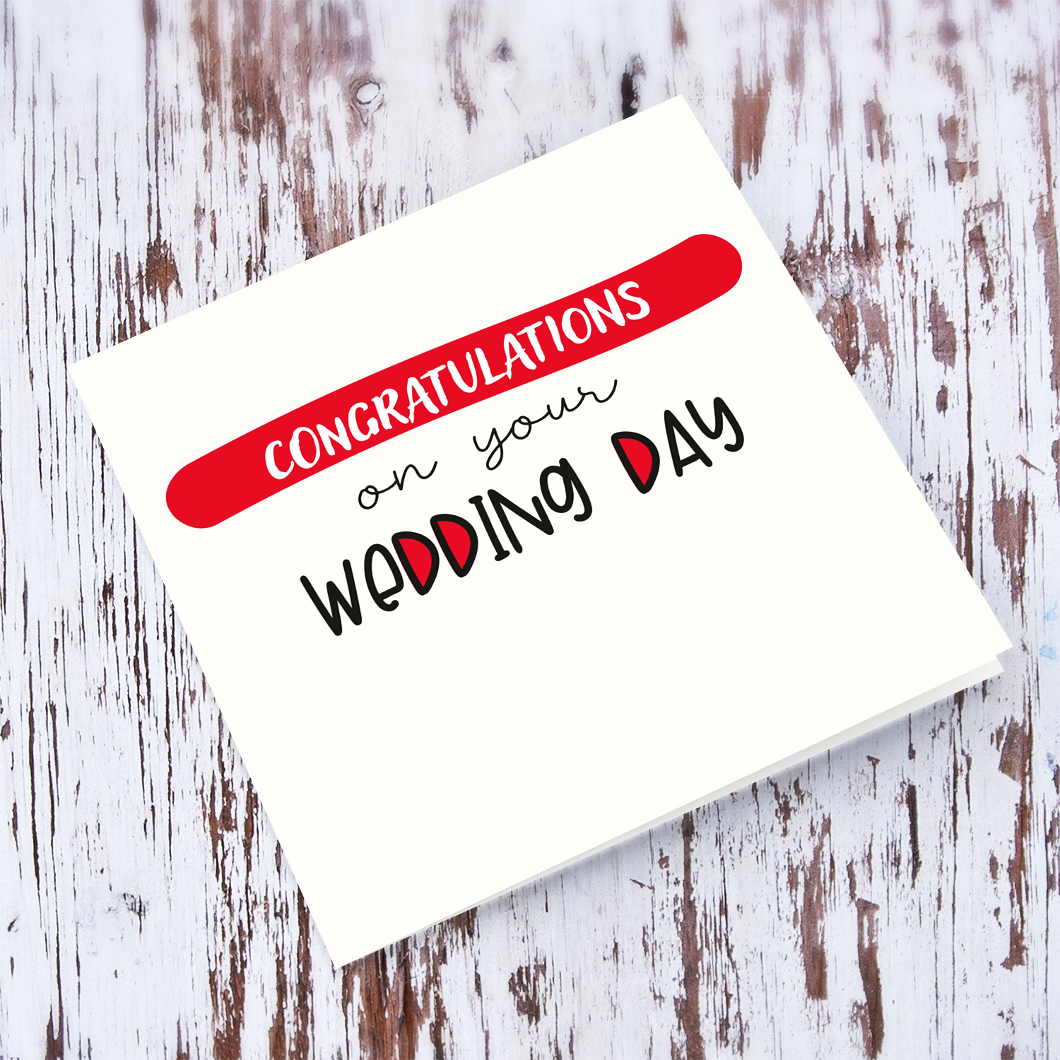 A beautiful Wedding card in a light cream background and red touches in English