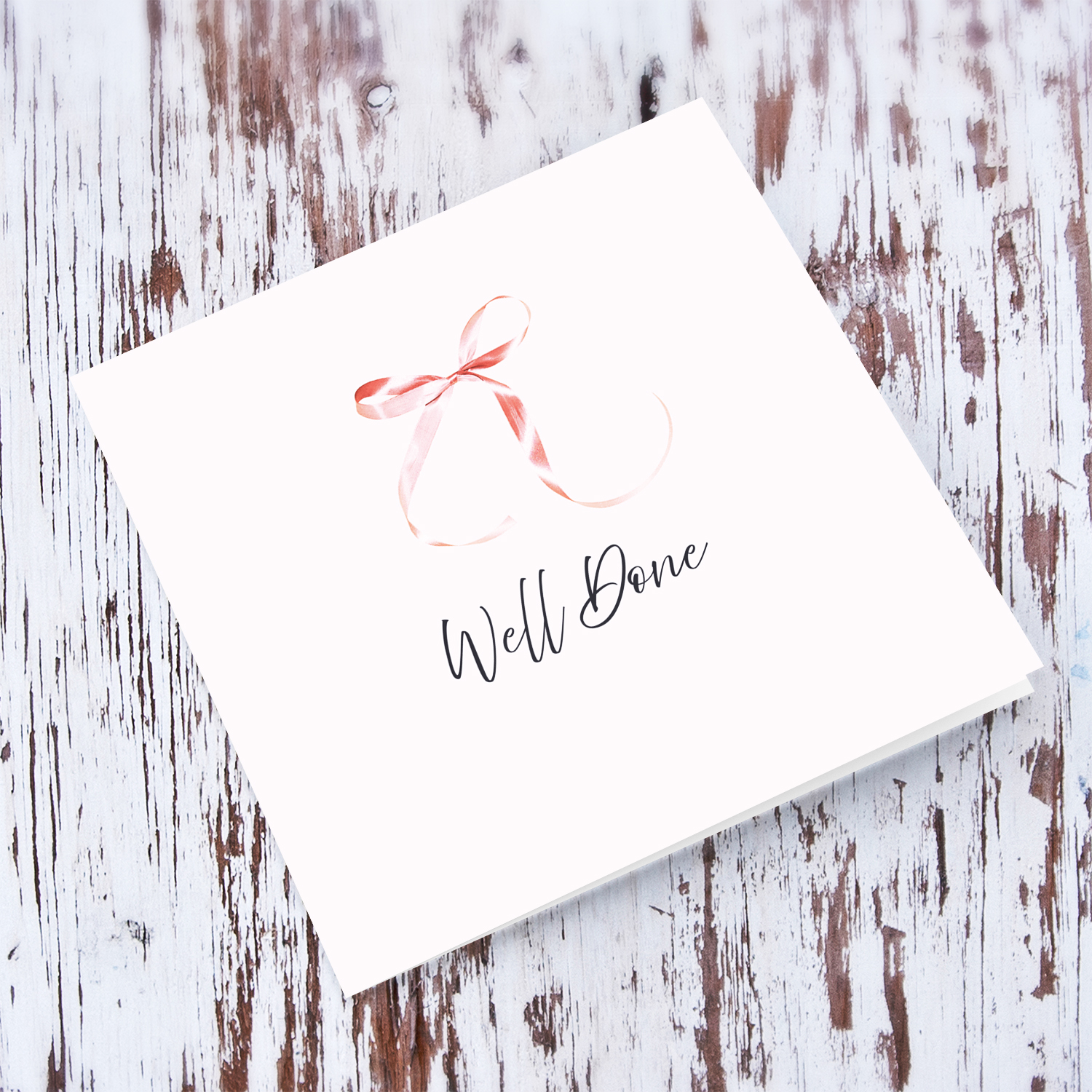 Minimalist and dainty open well done card with cute pink bow and light pink background in English
