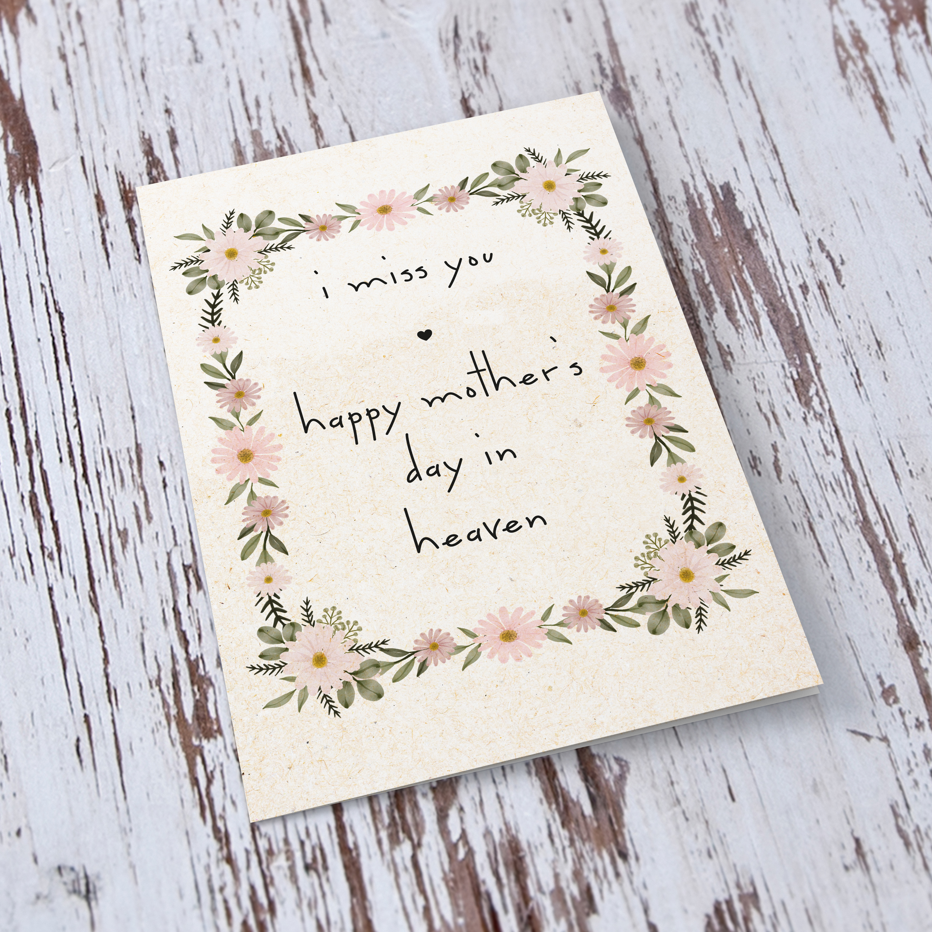 A special mother's day in Heaven card in a light pink floral border in English